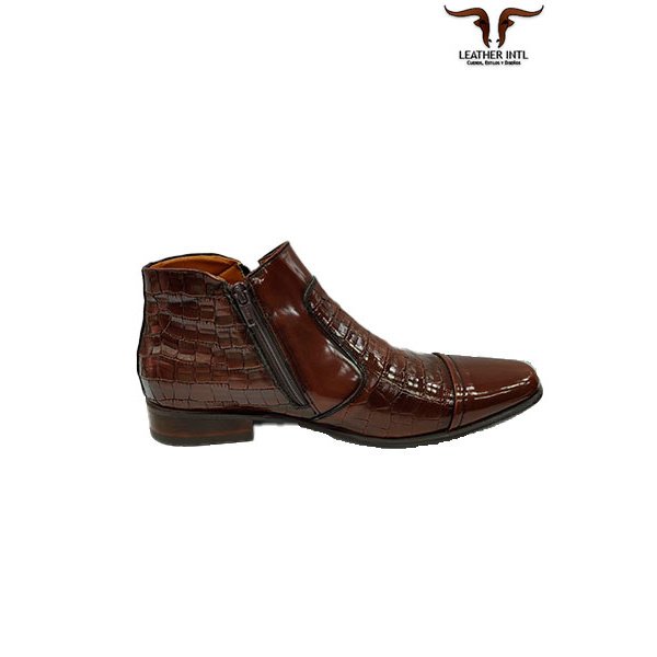 Botas para caballero en cuero rivera y suela de grupón, con cremalleras a los lados, en color café