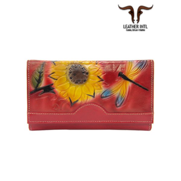 Billetera corta en cuero para dama con broche varios compartimentos marcada en tala con mariposas